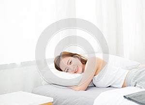 Portrait of beautiful asian young woman sleep lying in bed with head on pillow comfortable and happy with leisure