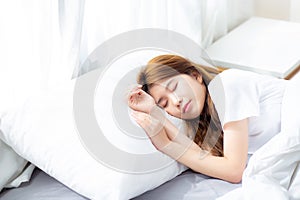Portrait of beautiful asian young woman sleep lying in bed with head on pillow comfortable and happy with leisure.