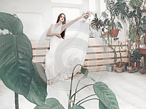 Portrait  of beautiful  balerina woman weared in white dress photo