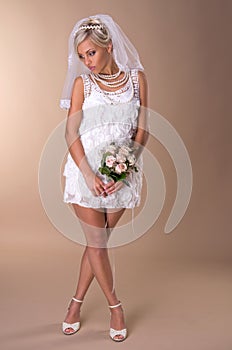 Portrait of beautiful blonde bride photo