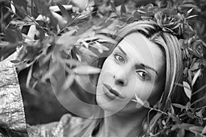 Portrait of a beautiful blonde woman in the flower crown