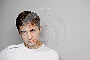 Portrait of beautiful boy with attentive look