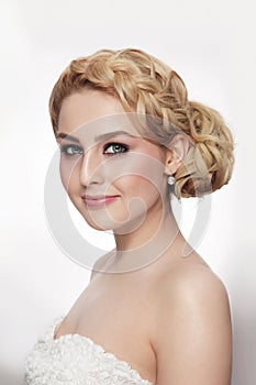 Portrait of beautiful bride with fancy prom hairdo