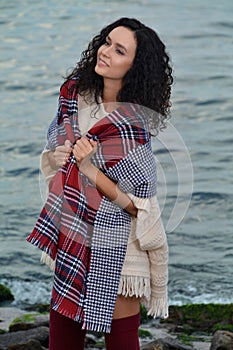 Portrait of a beautiful brunette on the beach