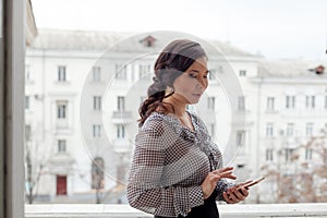 Portrait of a beautiful business woman Asian woman talking on a smartphone