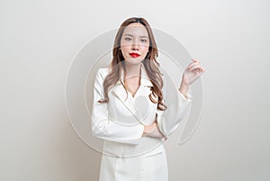 Portrait beautiful business woman in white dress suit
