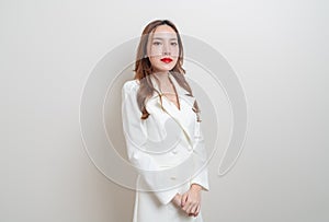 Portrait beautiful business woman in white dress suit