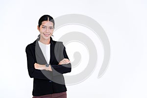 Portrait of beautiful businesswoman smiling standing and looking at the camera while arms crossed isolated on white background
