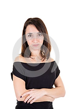 Portrait of beautiful businesswoman standing with arms folded and looking at camera isolated over white background