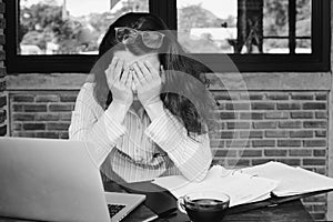 Portrait of beautiful businesswoman stressed from work.