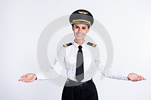 Portrait of beautiful cheerful chief pilot girl welcoming you invite business trip travel isolated over white color