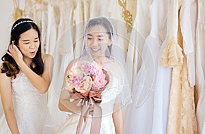 Portrait of beautiful couple asian woman bride happiness and funny togethe,Ceremony in wedding day,Happy and smiling