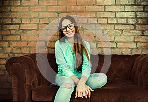 Portrait of a beautiful cute teen girl in the living room