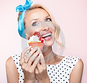 Portrait of beautiful delicate blonde woman with sweets