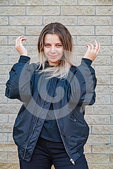 Portrait of a beautiful European girl with loose hair against the background of nature. selective focus