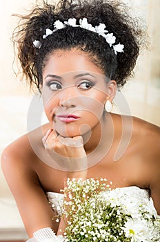 Portrait of beautiful exotic emotional bride