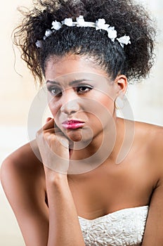 Portrait of beautiful exotic emotional bride