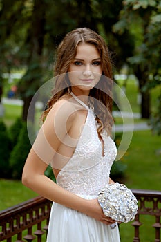 Portrait of a beautiful fashion bride, sweet and sensual. Wedding make up and hair