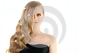 Portrait of Beautiful Fashion Model with Natural Make up with Long Eyelashes and Long Blonde Wavy Hair