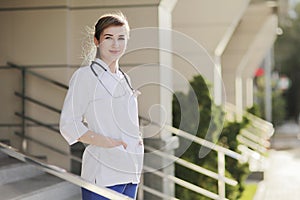 Portrait of a beautiful female doctor or nurse. Health concept