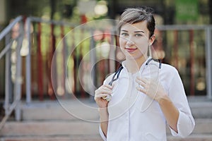 Portrait of a beautiful female doctor or nurse. Health concept