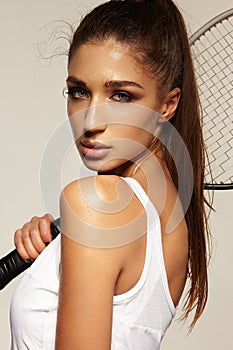 Portrait of beautiful fitness woman, tennis player
