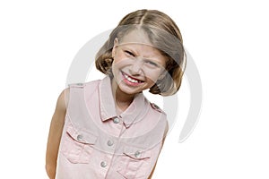 Portrait of beautiful girl of 7, 8 years old. Child with perfect white smile, isolated on white background