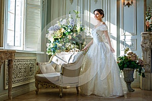 Portrait of a beautiful girl in a ball gown in the interior. Concept of tenderness and pure beauty in sweet princess look. Beautif