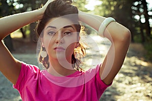 Portrait of beautiful girl close-up with sunlight