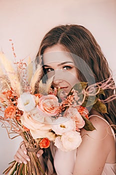 Portrait of beautiful girl in  flower gazebo