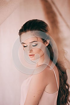 Portrait of beautiful girl in  flower gazebo