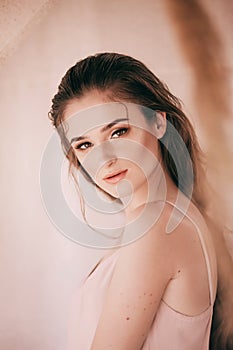 Portrait of beautiful girl in  flower gazebo