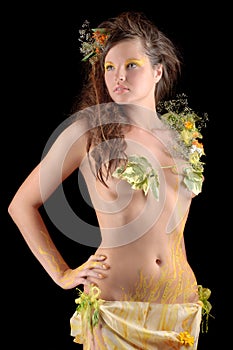 Portrait of beautiful girl with flowers bodyart photo