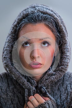 Portrait of beautiful girl with frost on face