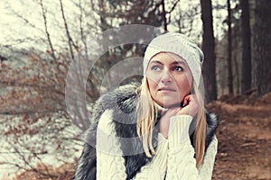 Portrait of beautiful girl on moody autumn day.