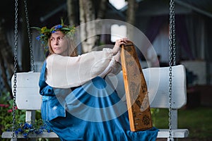 Portrait of Beautiful girl with Music instrument gusli