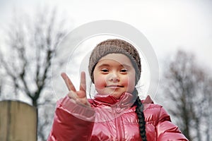 Portrait of beautiful girl in the park