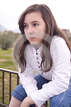 Portrait of beautiful girl in the park