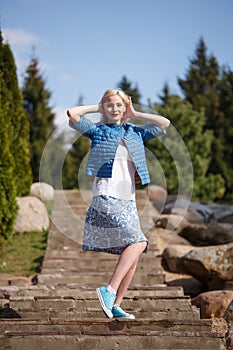 Portrait of beautiful girl posing in the Park