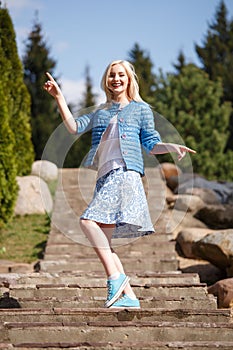 Portrait of beautiful girl posing in the Park