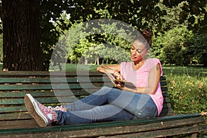 Portrait of a beautiful girl reading