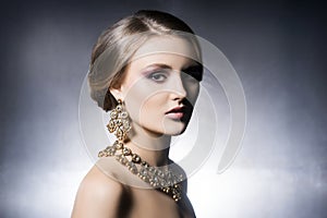 Portrait of beautiful girl in shiny jewels