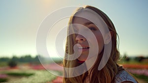 Portrait of beautiful girl smiling in blue sky background. Closeup smiling woman