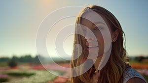 Portrait of beautiful girl smiling in blue sky background. Closeup smiling woman