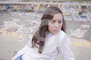 Portrait of beautiful girl in a urban space