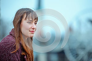 Portrait of beautiful girl walking on street in old town Tallinn