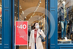 Portrait of beautiful girl wearing protective medical mask