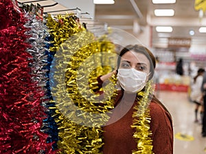 Portrait of beautiful girl wearing protective medical mask