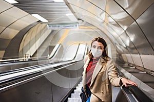 Portrait of beautiful girl wearing protective medical mask