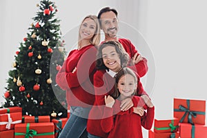Portrait of beautiful handsome careful cheerful family folded arms support team at decorated light home house indoors